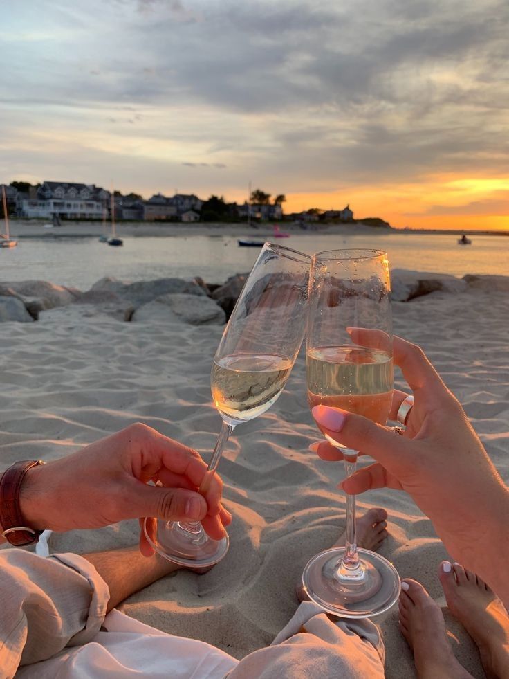 Summer blog couple cheers beach