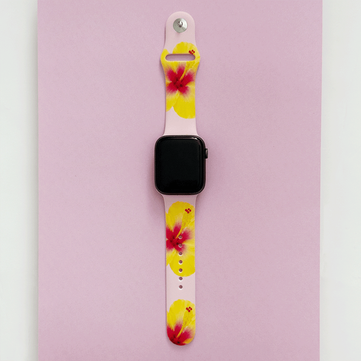 Pink Apple Watch Strap with yellow hibiscus flowers.