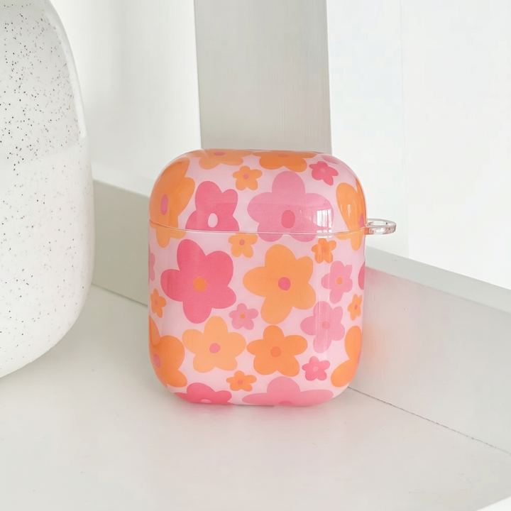 Pink and orange patterned AirPods Case.