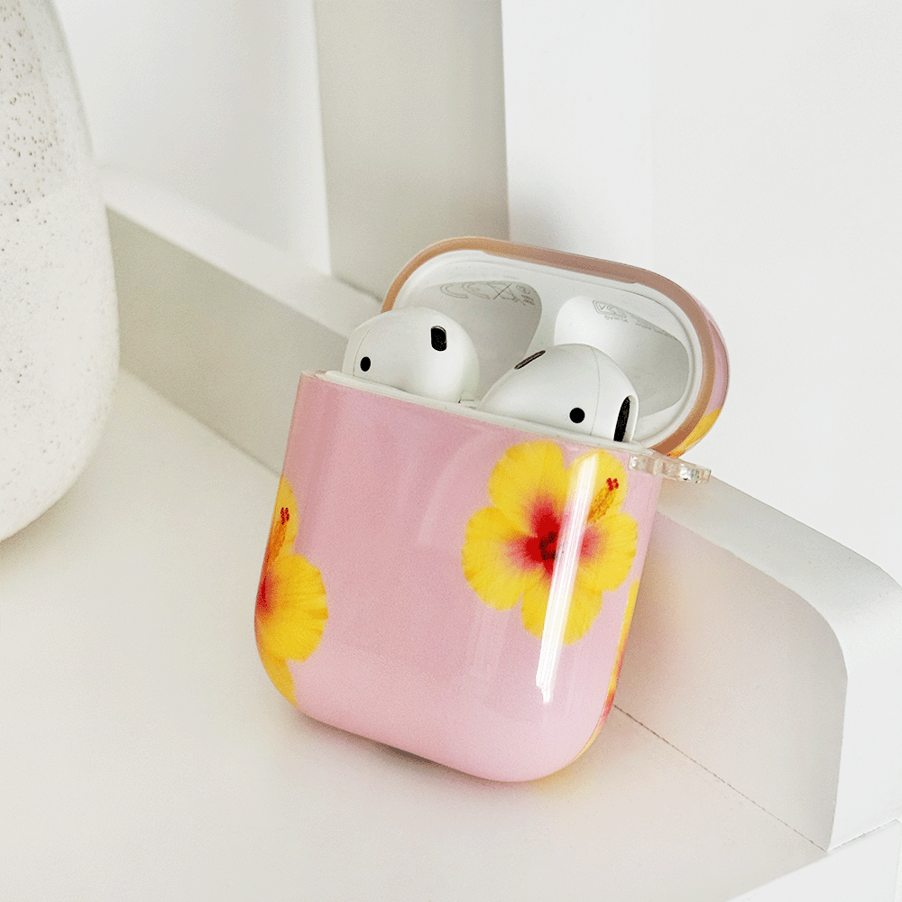 Pink AirPods Case with yellow hibiscus flower design.
