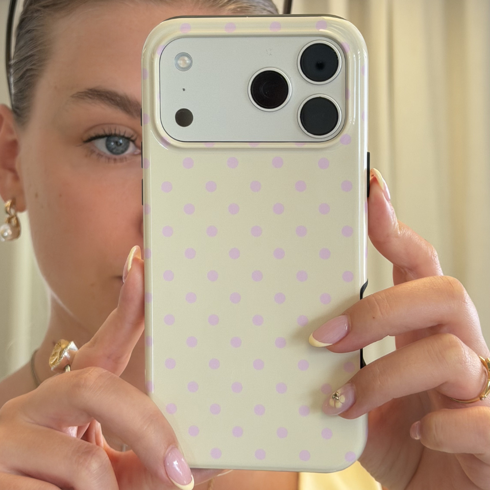 Girl taking mirror selfie up close with Butter Blush Tough Phone Case