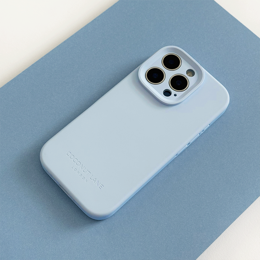 Blue Phone Case with 'Coconut Lane' branding on a pink background.