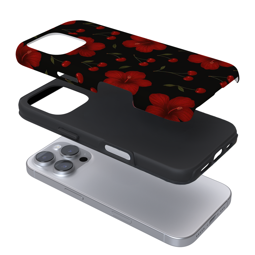 Expanded view of a phone case with a red hibiscus and cherry pattern on a white background