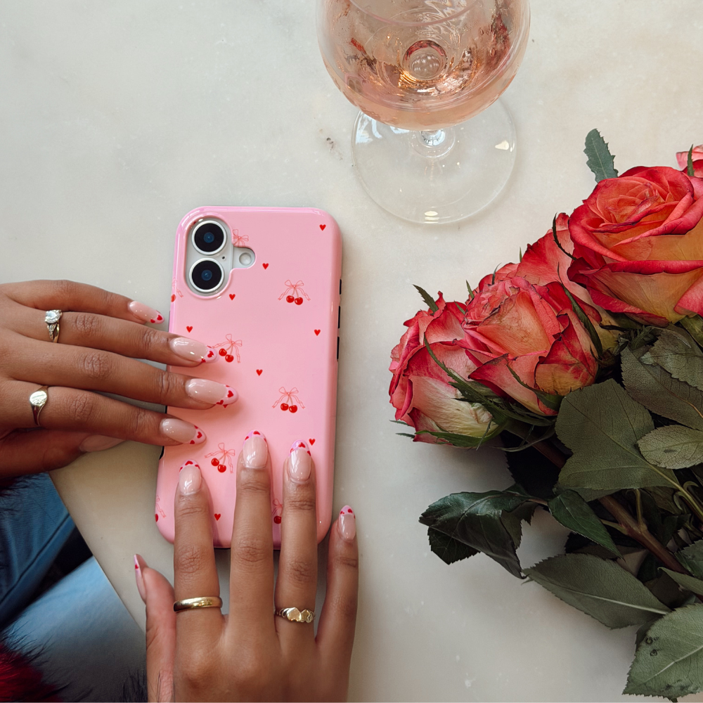 cherrytiedphonecaseontable