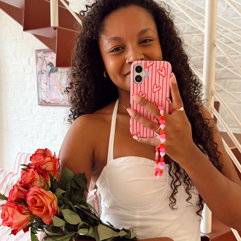 Girl smiling holding phone case