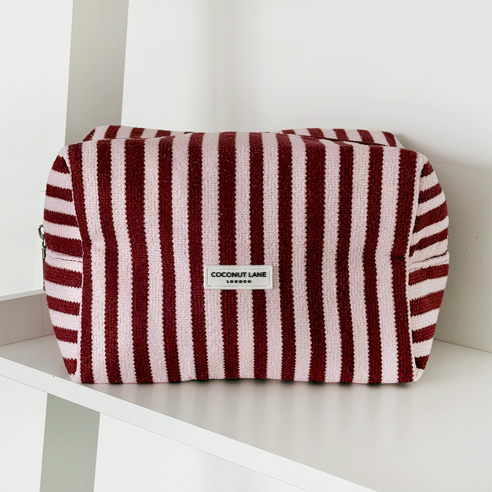 Burgundy and light pink striped Makeup Bag, silver zip and Coconut Lane logo badge.