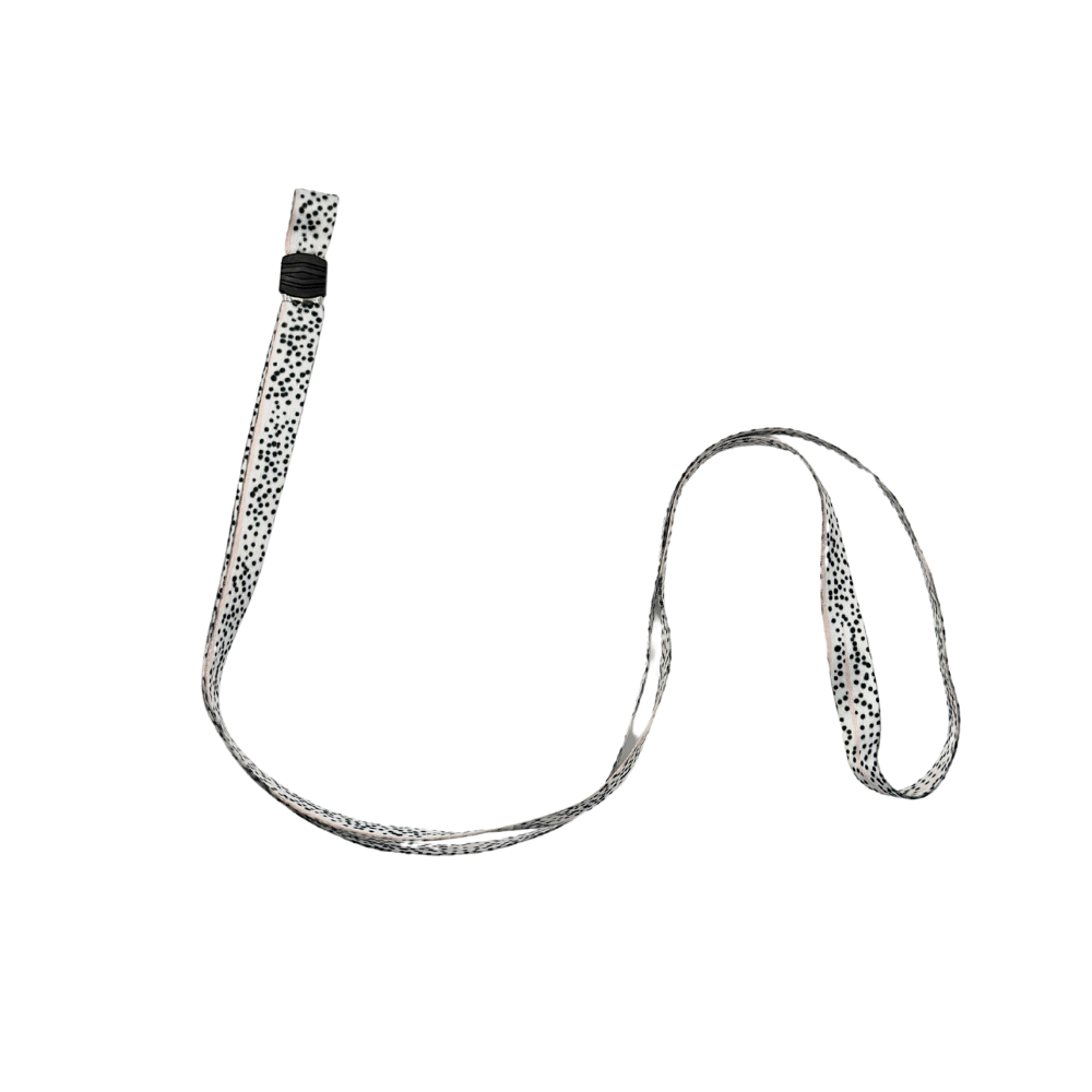 A white lanyard with a black polka dot pattern on a plain white background, featuring a plastic clip near the top for attaching items such as keys, ID cards, or even the Coconut Lane Universal Phone Lanyard Patch from the Patch Bundle for enhanced phone security.