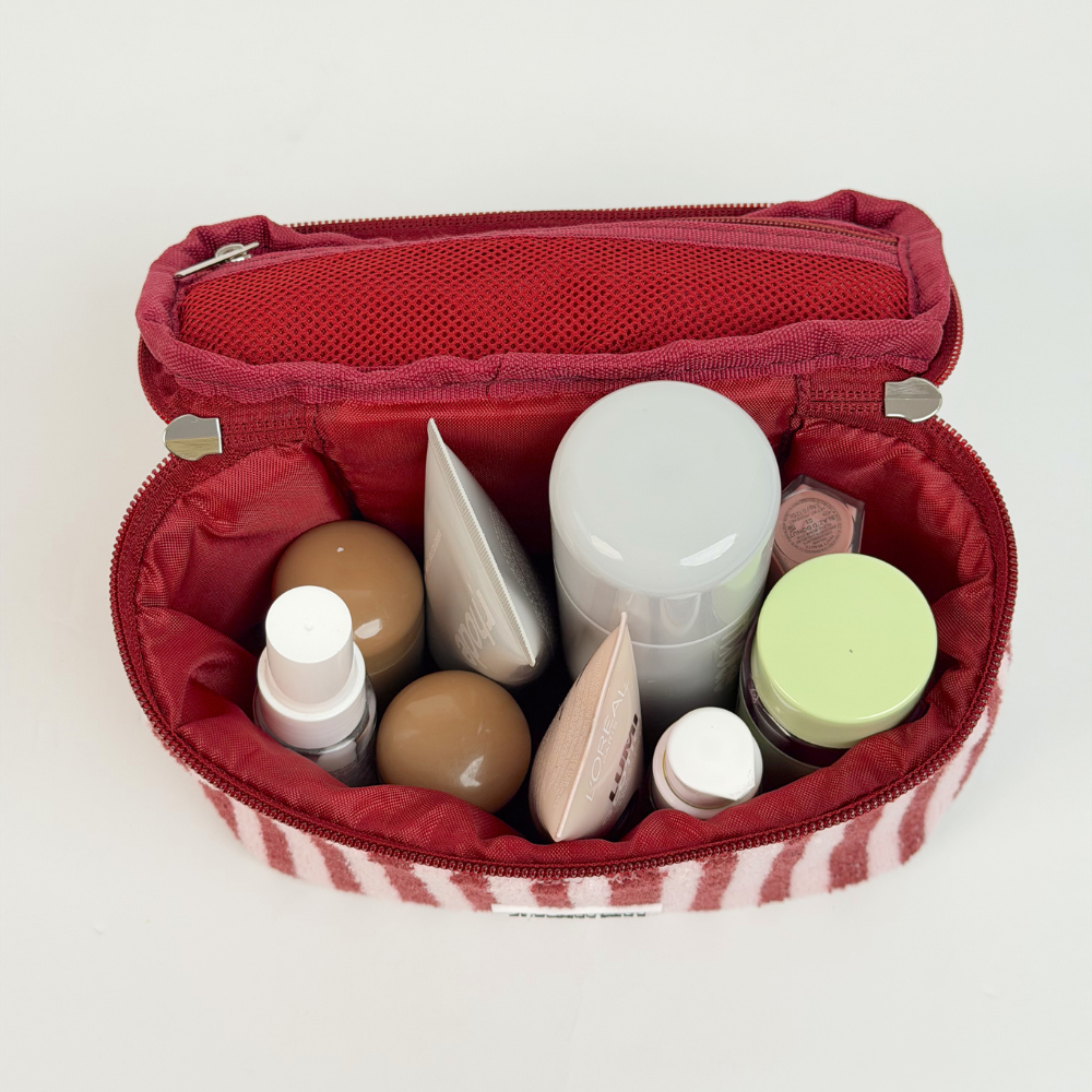 Open mini vanity with makeup inside