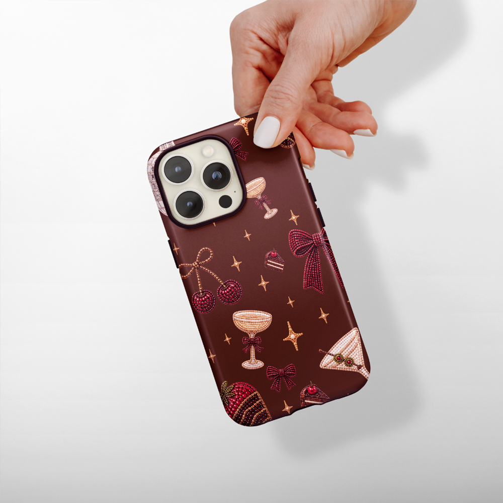 Cute christmassy beaded icons on a chocolate brown case.