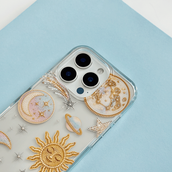 Clear Phone Case with celestial illustrations; stars, space, moon and sun.