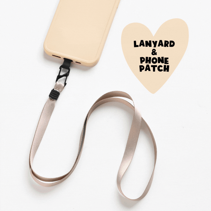 A beige phone case connected to a taupe lanyard is showcased adjacent to a heart-shaped design featuring the text "Universal Phone Lanyard Patch Bundle." This practical accessory, designed by Coconut Lane, ensures phone security with its sturdy black clip, combining style and function against a white background.