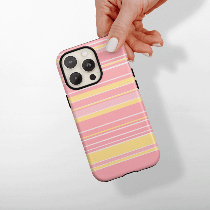 White, pastel pink and butter yellow stripes.