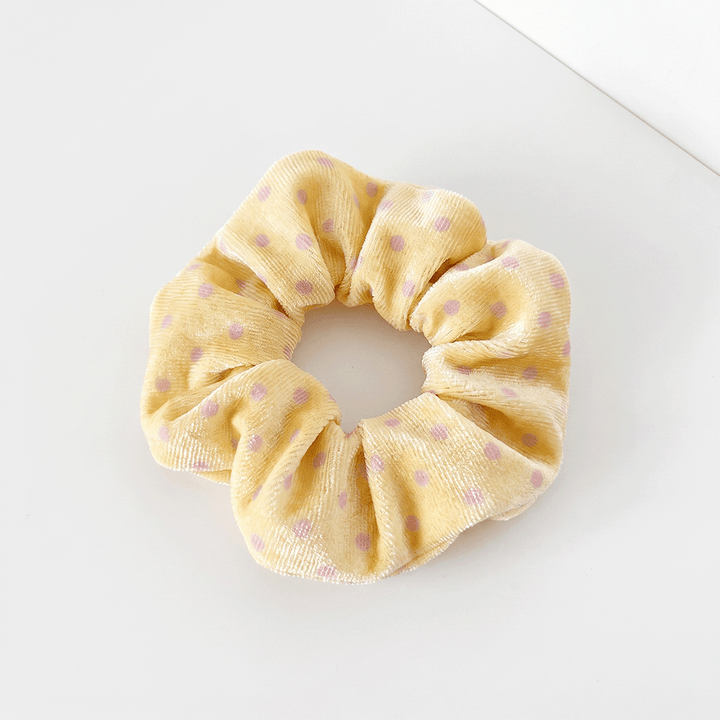 Pale yellow Scrunchie with baby pink polka dots.