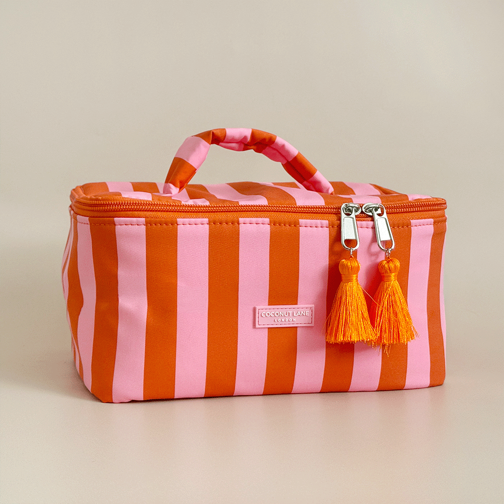 Orange and pink stripe Vanity Case, with tassels and padded handle.