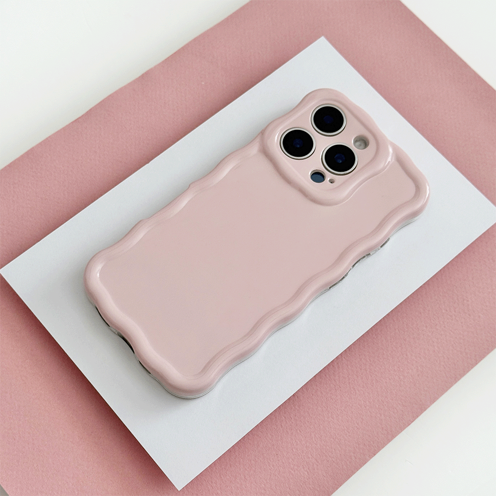 Plain baby pink coloured Phone Case with wavy edge effect.