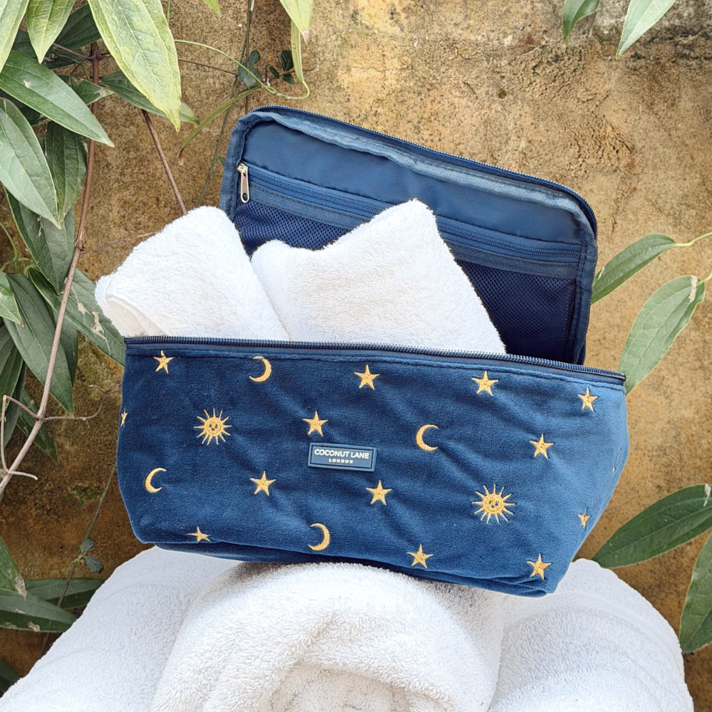 Celestial Vanity Case in spa setting with white mini towels inside